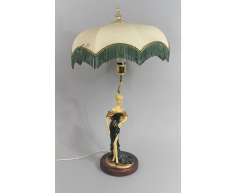 A Modern Figural Table Lamp with Shade 
