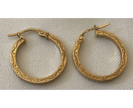 A pair of 9ct gold hoop earrings. Decoration to both sides of earrings. Being sold on behalf of Hillside Animal Sanctuary. Ap