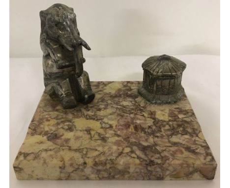An Art Deco style marble based standish with metal elephant figure &amp; basket shaped Inkwell.  Base Measures Approx. 14cm x