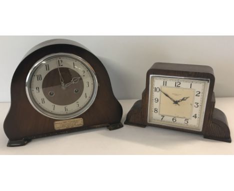 An Art Deco Garrard 8 day wooden cased mantle clock made for Croydon &amp; Sons, Ipswich.&nbsp;Together with a Smiths wooden 