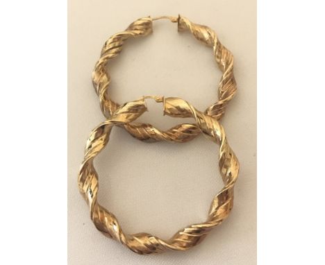 A pair of 9ct gold large twisted hoop earrings. Approx. 5 cm diameter. Being sold on behalf of Hillside Animal Sanctuary. App
