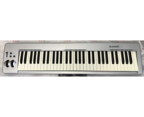 A M-Audio Keystation 61 ES midi keyboard. Complete with usb cable, user guide and cd. 