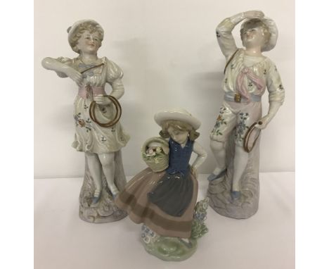 A group of 3 ceramic figurines comprising "Sweet Scent", a retired Lladro figure #5221. Together with a pair of continental p