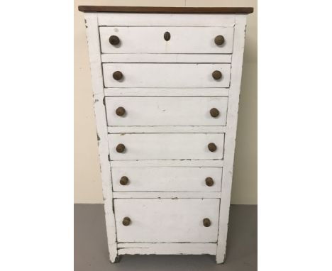 A vintage 6 drawer pine chest with natural wood top and drawer handles. Painted White. Approx. 124cm Tall x 64cm Wide.