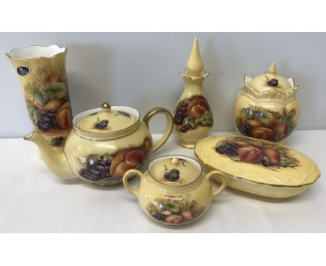4 boxed and 2 unboxed pieces of "Orchard Gold" pattern Aynsley ceramics. Comprising: Chantille lidded trinket pot, scent bott