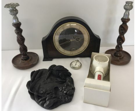 A box of assorted misc. items to include a vintage wooden cased Smiths mantel clock. Together with a pair of barley twist can