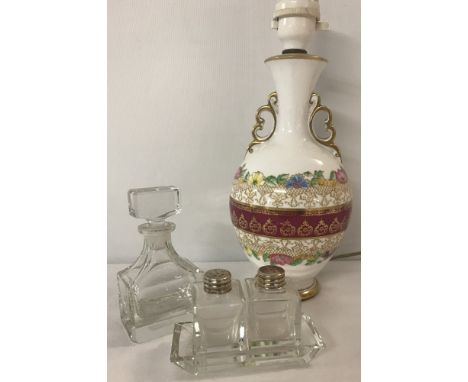 A vintage bone china lamp base together with glass cruet. Lamp has flower &amp; gilt decoration. Glass oil/vinegar bottle has
