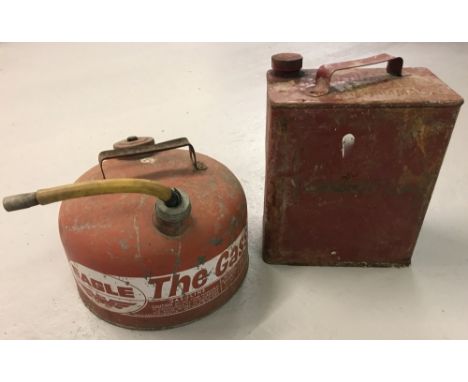 2 vintage petrol cans. 1 by Eagle and complete with feeding pipe.
