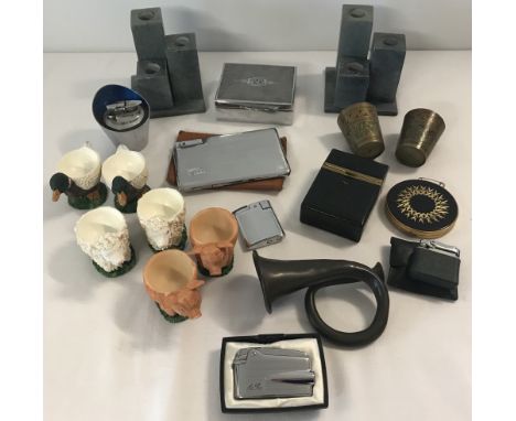 A small collection of mixed items to include vintage lighters and cigarette cases.  