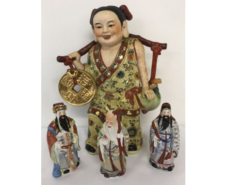 A large oriental ceramic figure  together with 3 smaller oriental ceramic figure of gentlemen.  Largest figure approx. 40cm t
