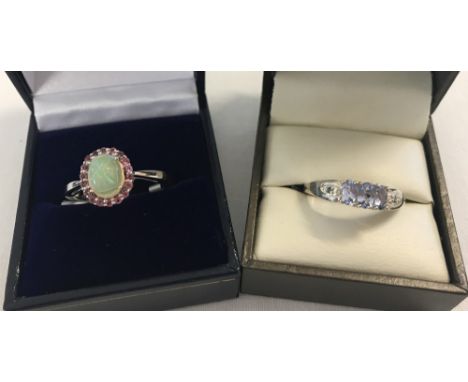 2 ladies stone set silver dress rings. A carved Welo Opal surrounded by small pink tourmaline stones together with a Lavender