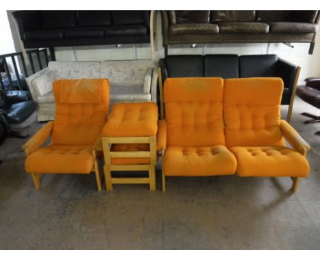 A four piece mid twentieth century beech framed lounge suite upholstered in an orange button fabric, consisting of a two seat