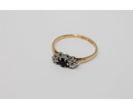 An 18ct gold sapphire and diamond ring