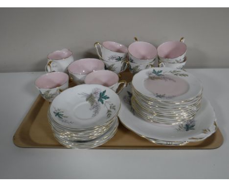 A tray containing a thirty four piece Queen Anne Louise part tea service