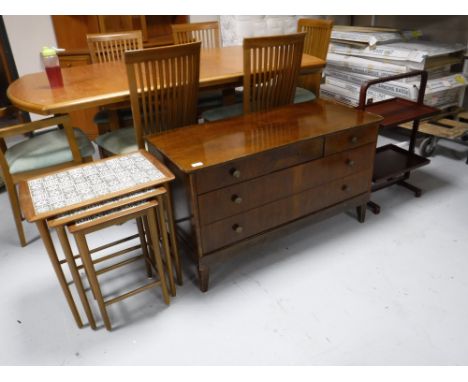 A mid twentieth century five drawer chest, together with a nest of three tile topped tables and a folding cake stand  