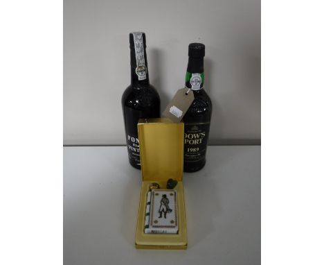 A bottle of Dow's Port vintage 1989, together with a bottle of Fonseca Port vintage 1977 and a Limoges Napoleon china hip fla