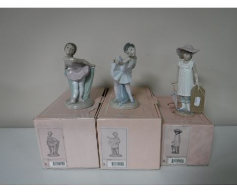 Three Nao figures, 'Girl Holding a Parasol', together with two ballerinas (boxed)