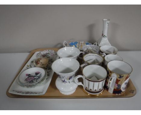 A tray containing Buckingham palace china mugs, together with a golden jubilee collection twin handled dish, a Minton cake pl