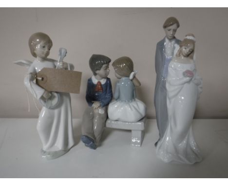 Three Nao figures; boy and girl on bench, angel, bride and groom 