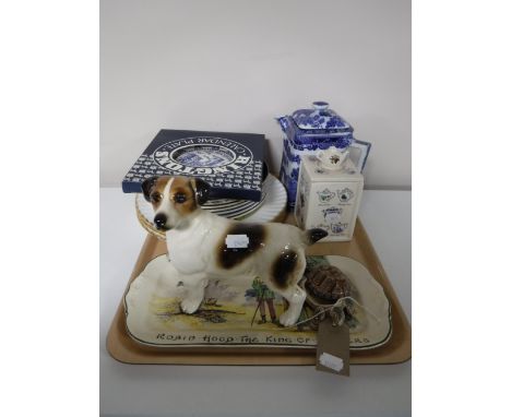 A tray containing a Ringtons blue and white tea pot, assorted wall plates, china figure of a terrier, Wade tortoise, Royal Do