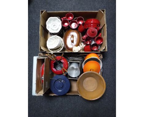 Two boxes of tea service, jelly moulds, fondue set, loaf tins etc 