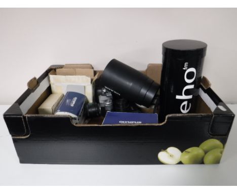 A Zenit E camera with lens, Olympus camera and camera accessories 