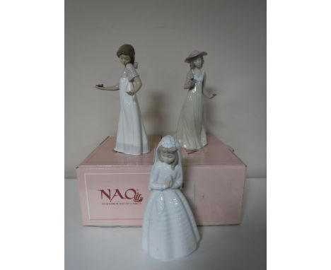 Two Nao figures boxed, 'Girl With Flower', 'Girl Holding Candlestick', (AF), together with an unboxed Nao figure, 'Holy Commu