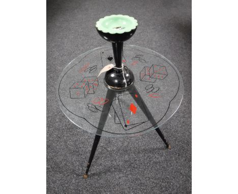 A 1960's Atomic Sputnik "Playing Card" glass occasional table, with splayed tripod legs below and smoker's companion above, o