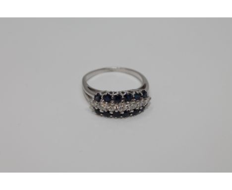 An 18ct white gold sapphire and diamond ring