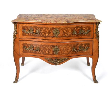 A Louis XV style rosewood, kingwood and floral marquetry commode, 3rd quarter 19th century, of serpentine shaped form, with a