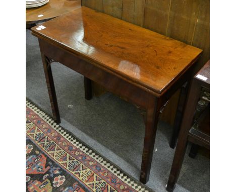 An 18th century mahogany fold over card table, 81cm wide      