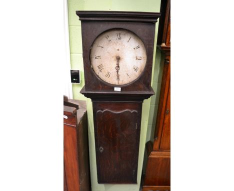 An oak tavern wall timepiece, early 19th century, flat top pediment, wavy trunk door, 13-inch circular painted dial with Roma