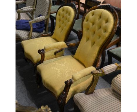 A Victorian walnut framed gents open armchair, the carved crest rail over an upholstered button back, above a serpentine stuf