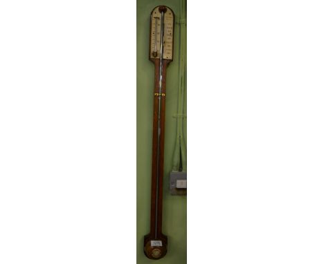 An oak stick barometer, signed J.Staniland, Malton, circa 1870, visible mercury tube, single vernier ivory dial signed, therm