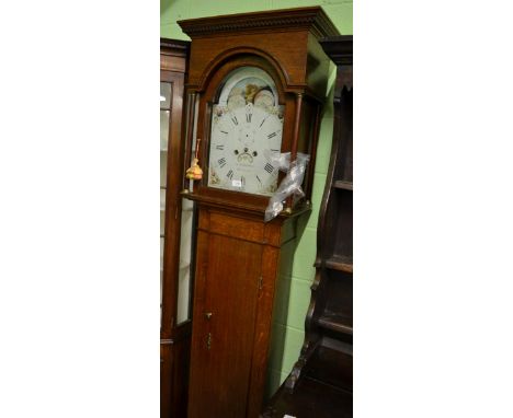 An oak eight day longcase clock, signed Jas Richardson, Helmsley, circa 1800, flat top pediment, 13-inch arched painted dial,