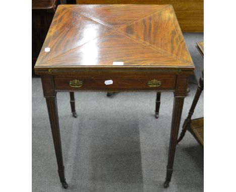 A late Victorian mahogany and boxwood lined envelope card table, by Maple & Co, with frieze drawer, on fluted square tapering