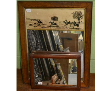 An early Victorian oak framed wall mirror, set with a silhouette panel titled HUNTING 1837, 65,5cm high; and another wall mir