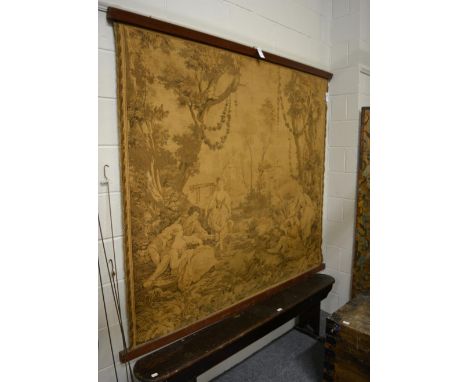 A Brussels machine made tapestry, West Europe, depicting a rural scene, 165cm by 190cm      Slight staining. 251116