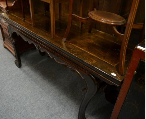 A Chinese elm console table with a wavy shaped apron, raised on cabriole legs with scroll toes, 175cm wide      