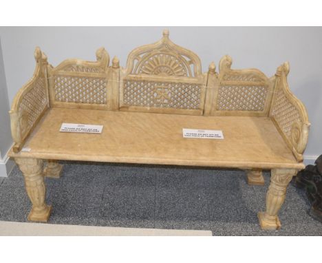 A carved marble garden bench, in 18th century style, with foliate carved ogee cresting pierced sides, solid seat, on fluted b