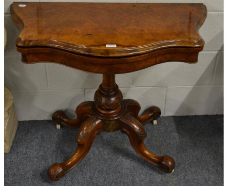 A Victorian figured walnut swivelling foldover pedestal card table, 92cm by 45cm, 75cm high      