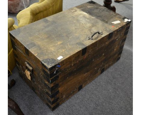 A 19th century metal bound and lead lined hinged trunk, 99cm wide      