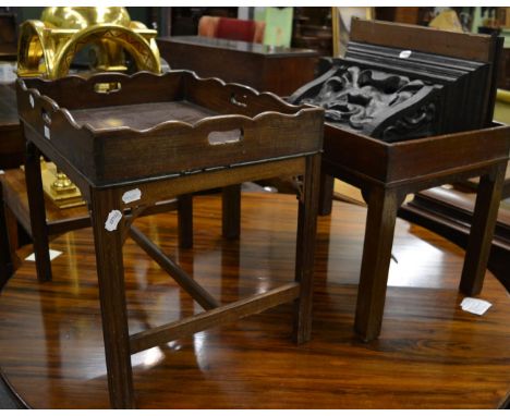 A mahogany butler's tray, 61cm wide, on later stand; a similar butler's tray; and a carved oak wall bracket (3)      