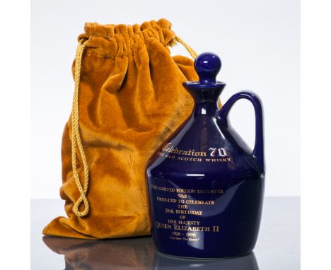 CELEBRATION 70 QUEEN ELIZABETH
Blended Scotch Whisky in blue Buchan flagon decanter with velvet pouch. Commemorates H.M. Quee