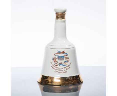 BELL'S PRINCE OF WALES BELL
Blended Scotch Whisky in white Wade ceramic decanter. 50cl, 40% volume.
 CONDITION REPORT: Very g