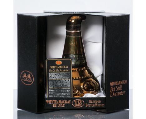 WHYTE & MACKAY DE LUXE POT STILL DECANTER
Blended Scotch Whisky. This unique reproduction of a Highland Copper Pot Still is m