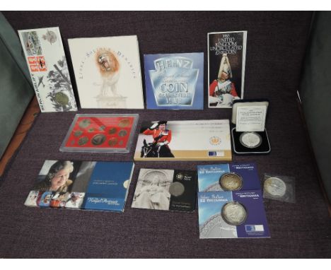 A collection of Royal Mint Coins and Sets including £2 Britannia 2000 x2, Silver Britannia 1999, Falklands Island £2 1991, Th