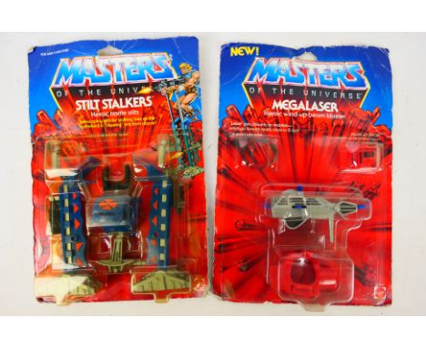 Mattel - MOTU - Two carded 1987 Mattel Masters of the Universe action figure accessory packs. Lot consists of a  'Stilt Stalk