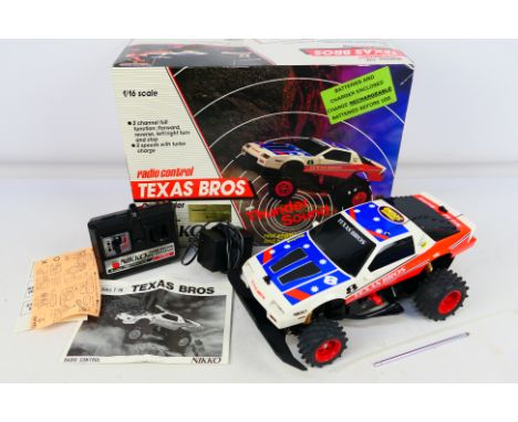 Nikko - A boxed Nikko #15460 Radio Control 'Texas Bros' Off-Roader. The model shows some  light signs of play and appears to 