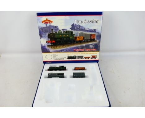 Bachmann - A part complete OO gauge The Coaler train set # 30-010. The Pannier Tank locomotive and 3 x wagons are present and